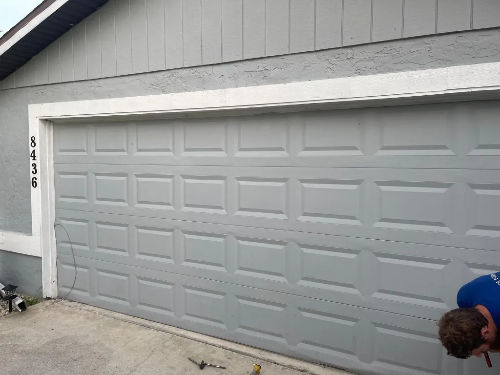 Modern garage door installation luxury home Palm Beach
